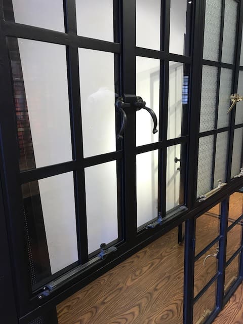 A window with bars and glass in it