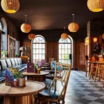 A restaurant with many tables and chairs in it