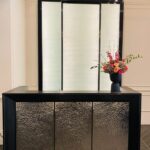 A vase of flowers sitting on top of a table.