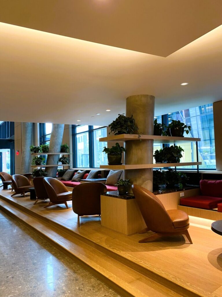 A room with many chairs and tables in it