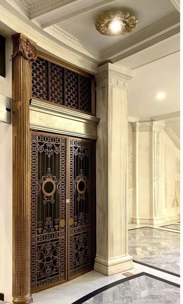 A large door with intricate designs on it.