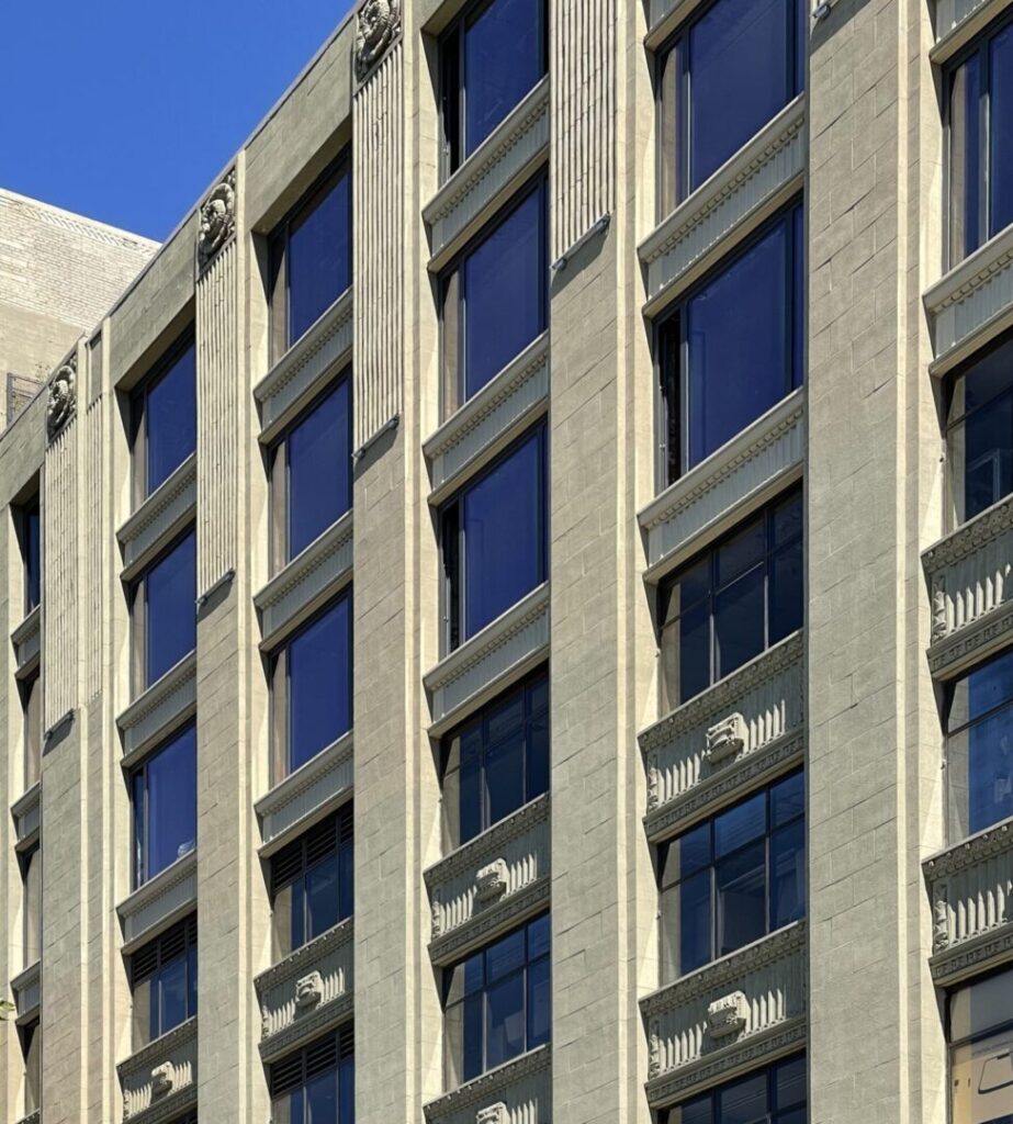 A building with many windows on the outside.