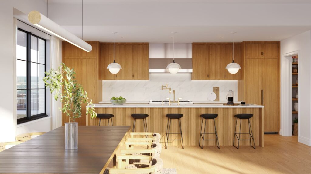 Modern kitchen with wooden accents and black bar stools.