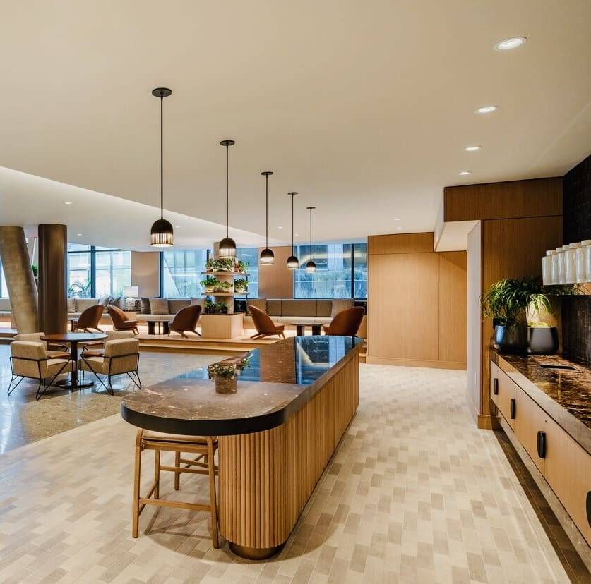 A large kitchen with wooden cabinets and island