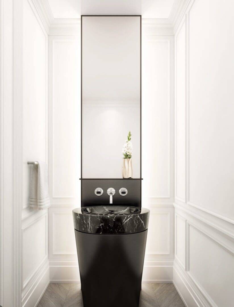 A bathroom with a sink and mirror in it