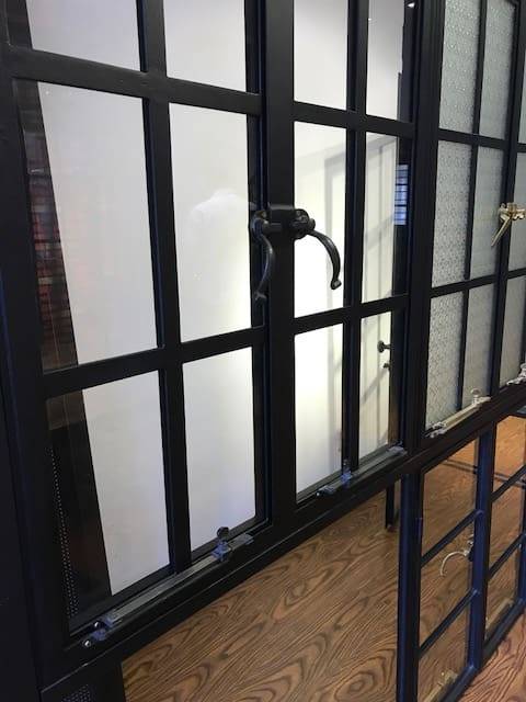 A window with bars and glass in it